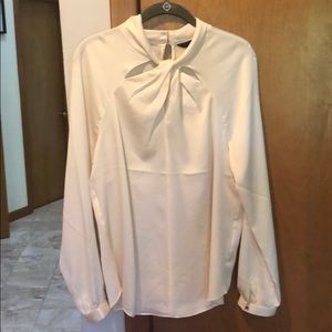 NWT ivory colored blouse from Banana Republic.